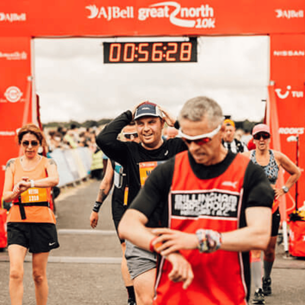 3 AJ Bell Great North 10k Runners finishing the AJ Bell Great North 10k race