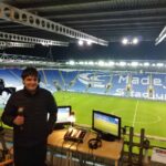 Broadcast setup overlooking Madejski Stadium football pitch