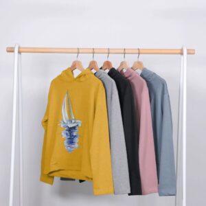 Coloured hoodies hanging on a clothing rack